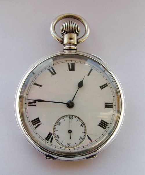 fig 1. Antique English 1908 silver pocket watch