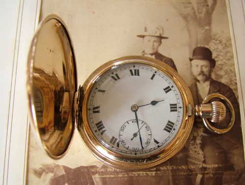 A 1920s Record 14 Ct Gold Filled Full Hunter Pocket Watch.
