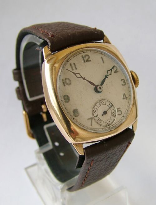 fig 1. 9ct gold cushion cased wrist watch, 1940