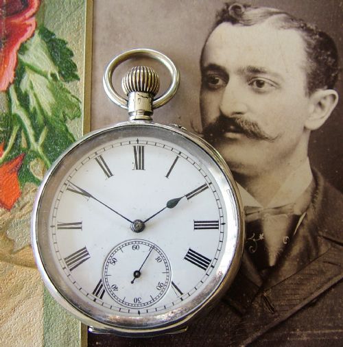 Antique Silver Swiss Stem Winding Pocket Watch.