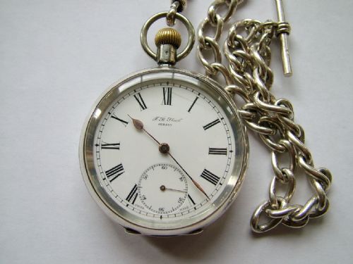 fig 2. Antique silver Omega pocket watch and chain