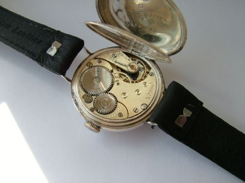fig 2. Antique silver Omega trench watch
