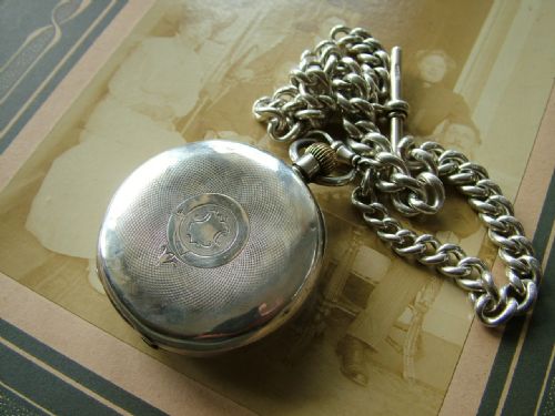 fig 2. Antique Omega pocket watch and chain
