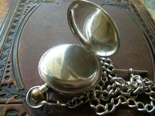fig 2. Antique silver Omega pocket watch