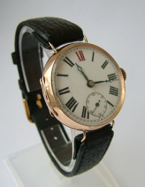 fig 1. An antique 9 carat gold trench watch