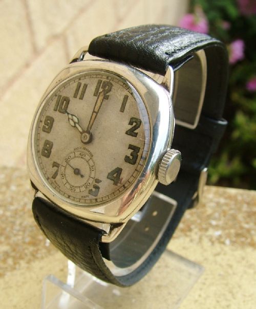fig 1. Gents silver 1930s cushion cased wrist watch