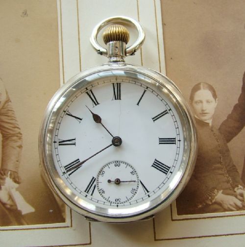 fig 1. An antique silver Omega pocket watch