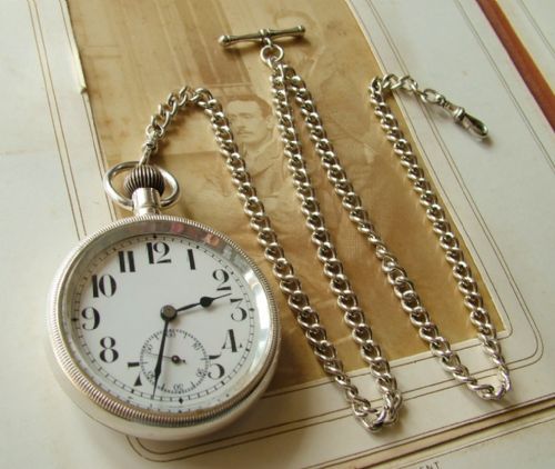 An Antique Pocket Watch and Chain, Circa 1910s
