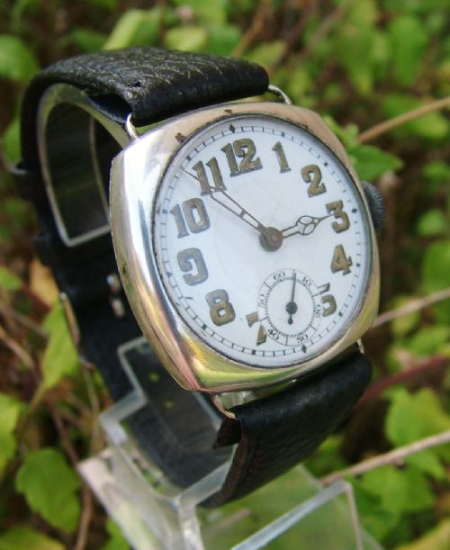 fig 1. A gents 1920s silver cushion cased wrist watch