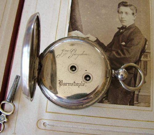 fig 2. An antique silver Longines pocket watch