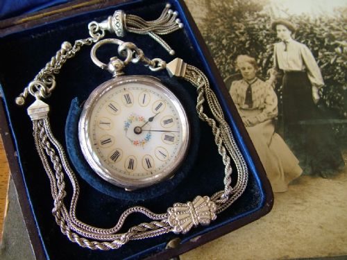 A Lady’s Antique Silver Fob Watch and Albertina