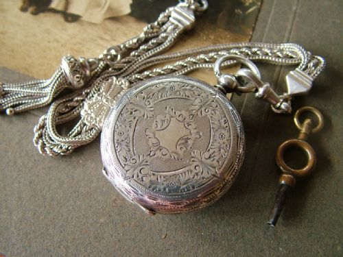 fig 2. A lady’s antique silver fob watch and albertina