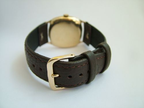 fig 2. Gents 9ct gold Record cushion cased wrist watch