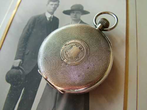 fig 1. A 1910s silver Swiss pocket watch