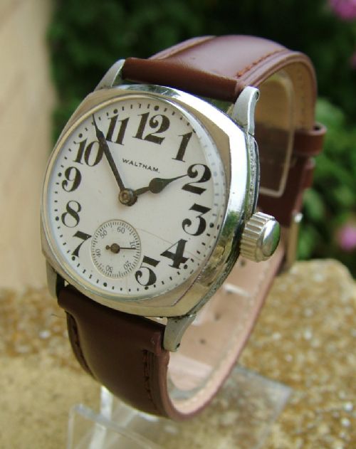 A Gents Cushion Cased Waltham Wrist Watch