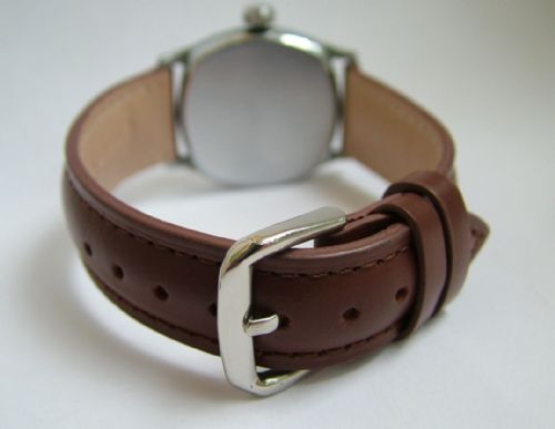 fig 2. A gents cushion cased Waltham wrist watch