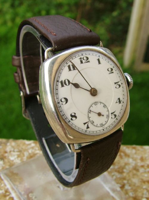 fig 1. Gents 1920s silver cushion cased wrist watch
