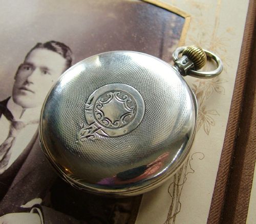 fig 1. An antique Waltham Traveler pocket watch