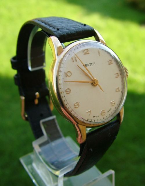 fig 1. A gents 9 carat gold Vertex Revue wrist watch 1956