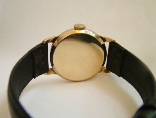 fig 2. A gents 9 carat gold Vertex Revue wrist watch 1956