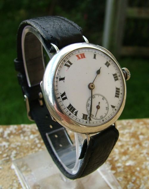 fig 1. A gents antique silver trench watch
