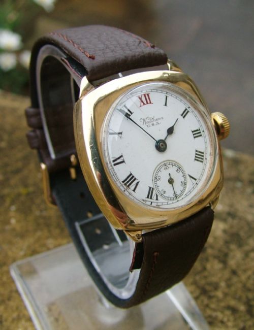 fig 1. Gents 9 carat gold Waltham cushion cased watch