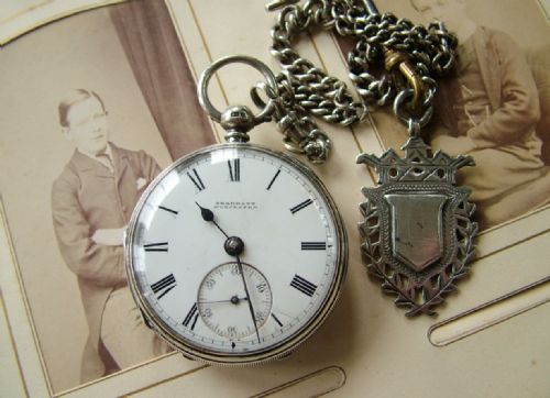 fig 1. An antique silver fusee pocket watch and chain