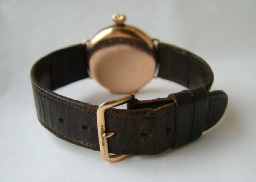 fig 2. A 9 carat gold Imshi trench watch