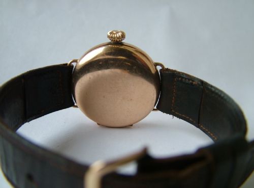 fig 3. A 9 carat gold Imshi trench watch