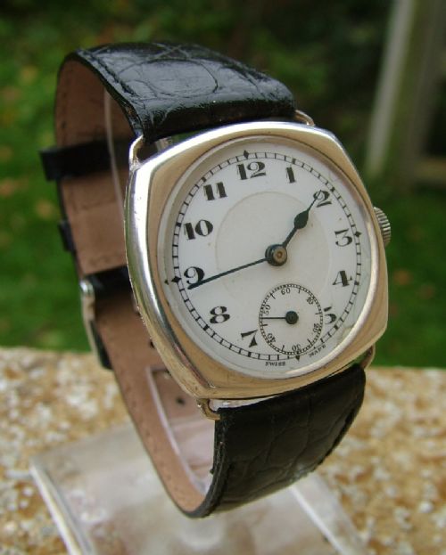fig 1. Gents silver iBiS cushion cased wrist watch