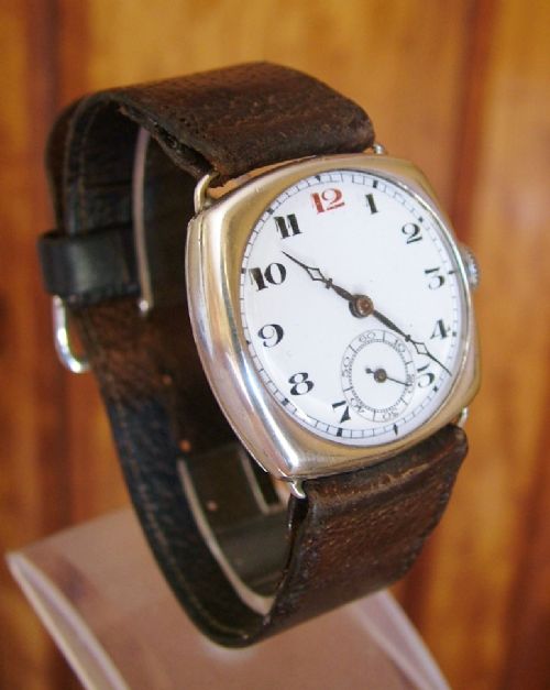 fig 1. Gents 1920s silver cushion cased wrist watch