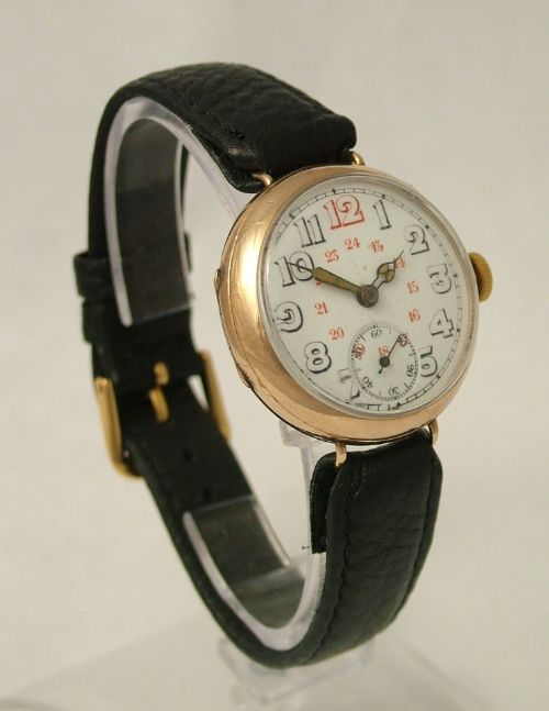 fig 1. An antique 9 carat gold Uno trench watch