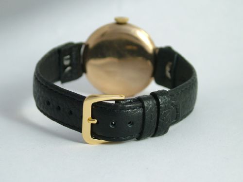 fig 2. An antique 9 carat gold Uno trench watch