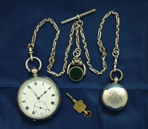 fig 1. Silver Tavannes pocket watch and accoutrements