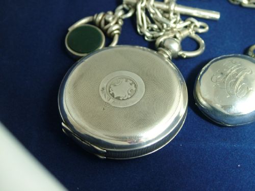 fig 2. Silver Tavannes pocket watch and accoutrements