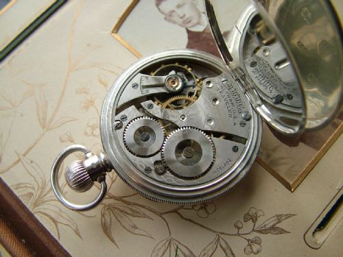 fig 1. A 1920s silver Waltham Traveler pocket watch