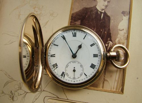 fig 1. 1920s full hunter pocket watch, chain and swivel