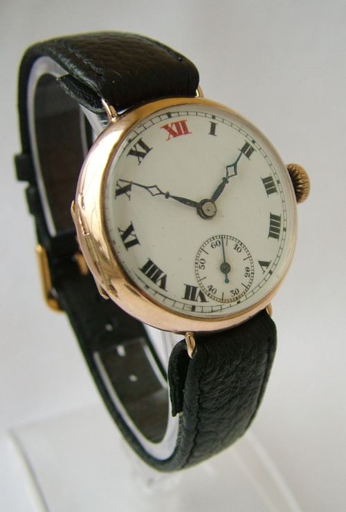 fig 1. A gents 9 carat gold trench watch, 1924