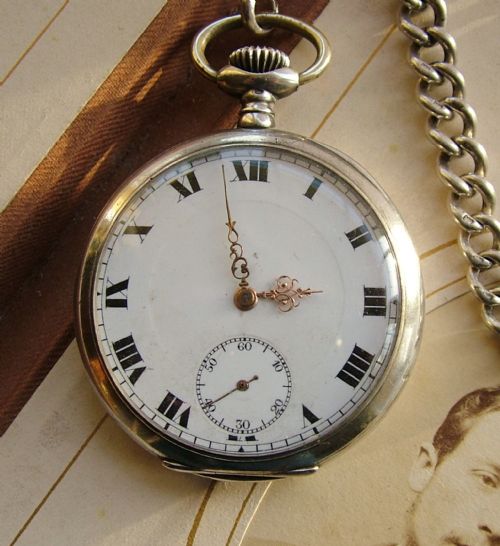 fig 1. Antique .800 silver pocket watch and chain