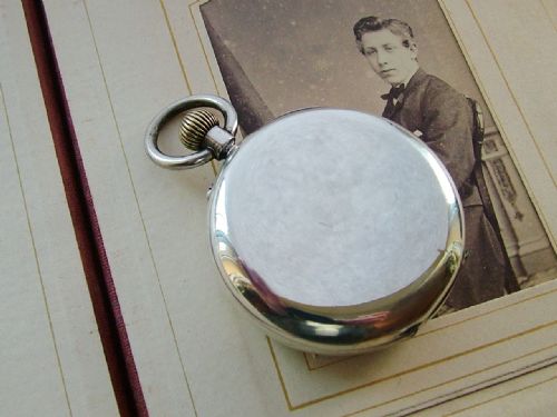 fig 1. An antique silver pocket watch, Sharpe of Retford