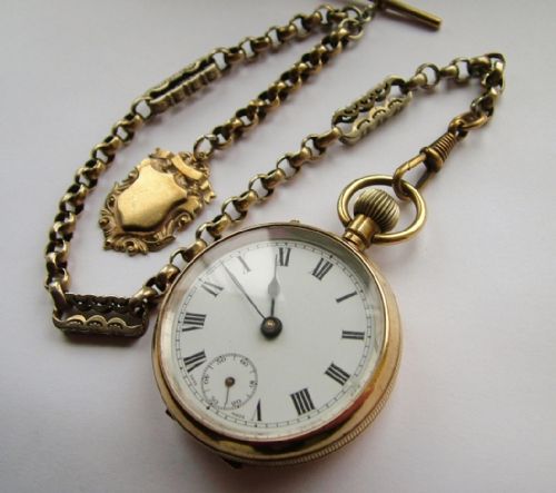 An Early 20th Century Brass Pocket Watch and Chain