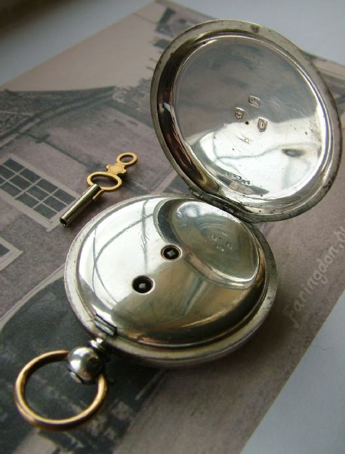 fig 2. An antique silver pocket watch, Counsell Faringdon