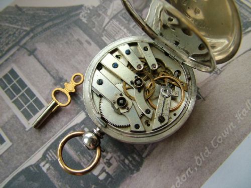 fig 3. An antique silver pocket watch, Counsell Faringdon
