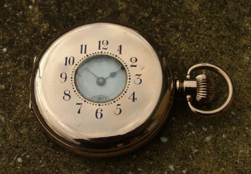fig 1. A 1920s Waltham half hunter pocket watch