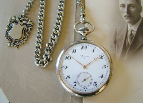 fig 1. A 1920s Longines pocket watch and chain