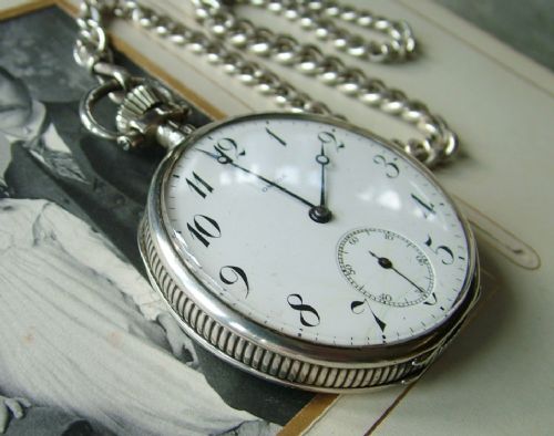 fig 2. Antique silver Omega pocket watch and chain