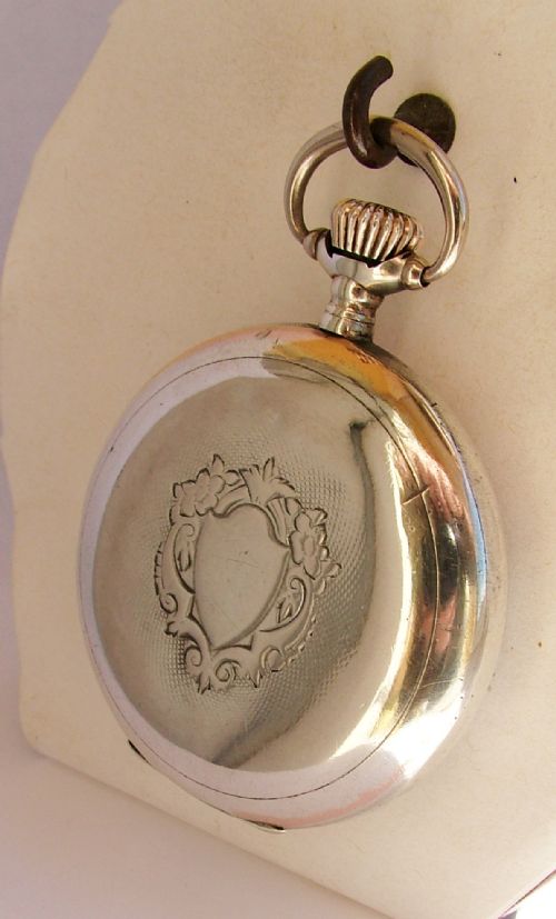 fig 1. Antique silver Omega pocket watch