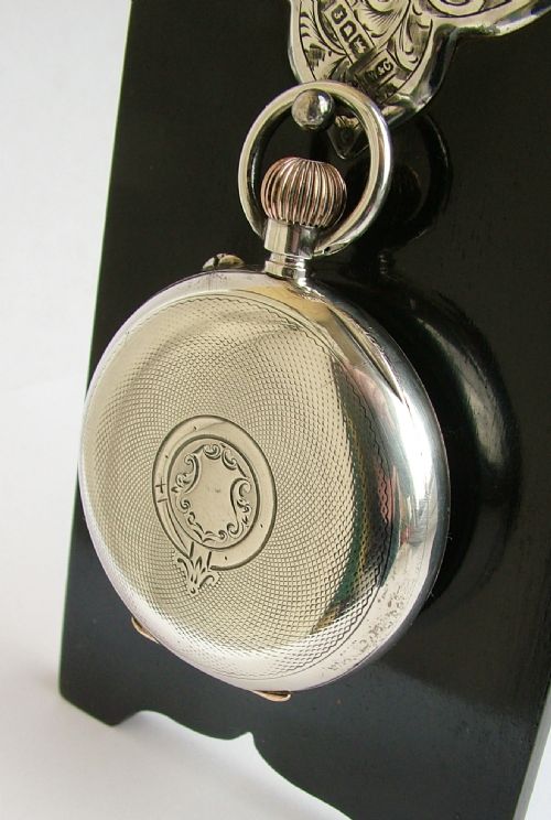 fig 2. Antique J.W.Benson silver pocket watch and stand
