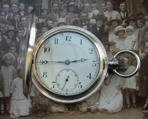 fig 1. Antique 1919 silver half hunter pocket watch.