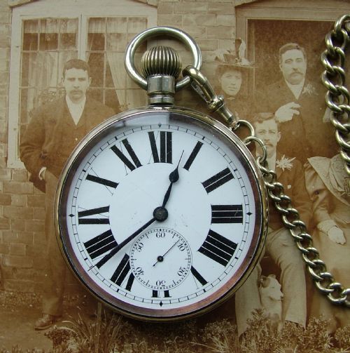 Antique Goliath Pocket Watch and Chain, Circa 1910s.
